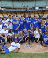 teams-blue-and-white-pose-together-after-the-hollywood-stars-game-at-picture-id596874324.jpg